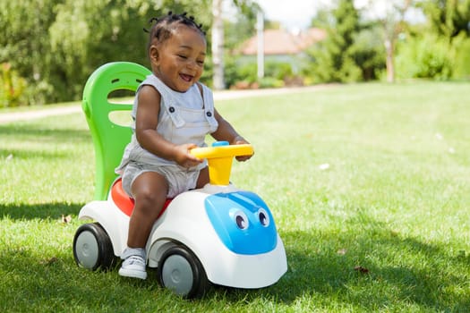 Adorable Little african american baby boy playing