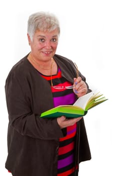 Senior woman reading a book - isolated on white background