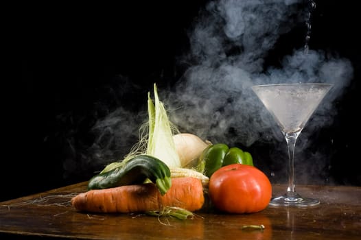 Still life of vegetables and liquid nitrogen