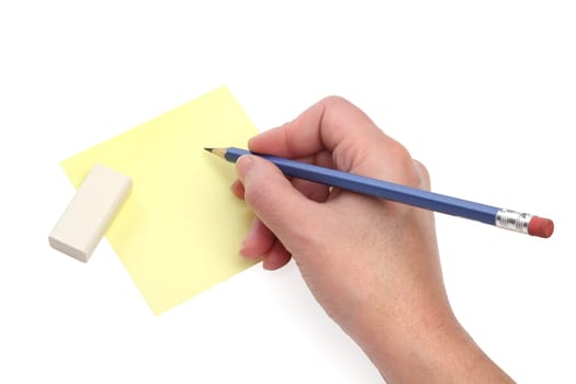 Writing hand with a blue pencil