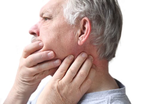 older man has difficulty moving his neck or jaw