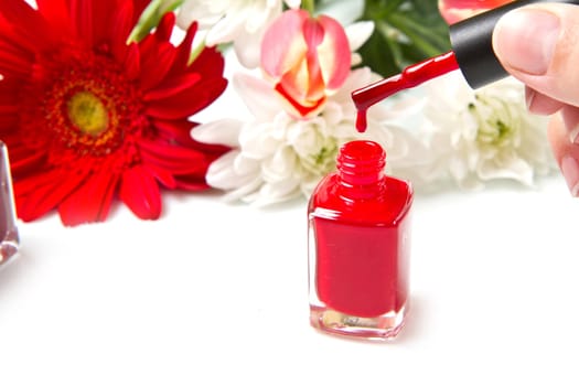 red nail polish with flower