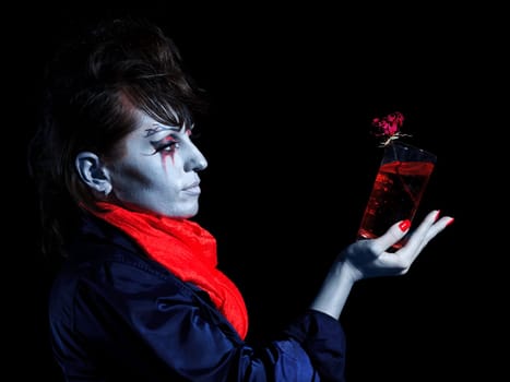 Woman as a vampire. Halloween face art