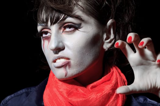 Woman as a vampire. Halloween face art