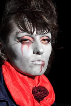 Woman as a vampire. Halloween face art