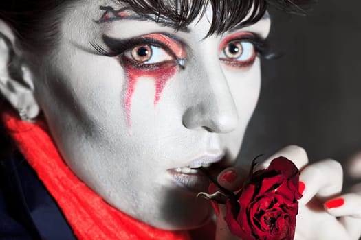 Woman as a vampire. Halloween face art