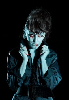Woman as a vampire. Halloween face art