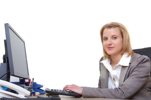 Young woman in office working on computer