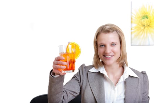 Young modern woman with a cocktail in her hand