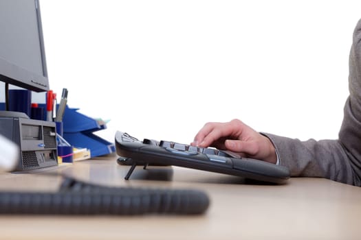 Woman's hand on computer keyboard