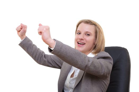 Successful businesswoman throwing up her arms