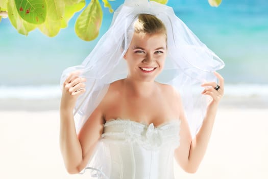 Beautiful young  bride on the tropical beach