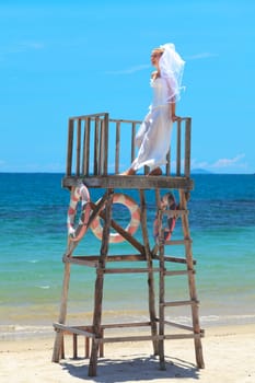 Beautiful young  bride on the tropical beach