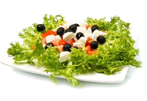 Fresh salad with olives, mozzarella cheese and  tomatoes