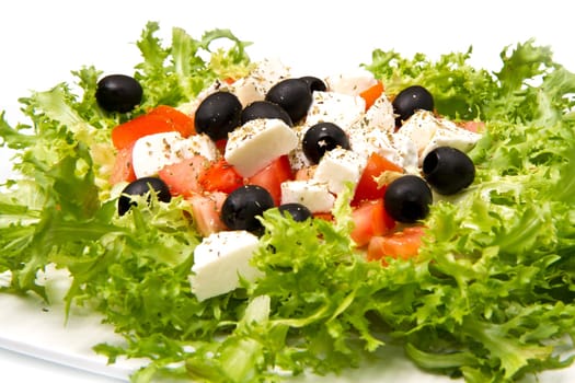 Fresh salad with olives, mozzarella cheese and  tomatoes