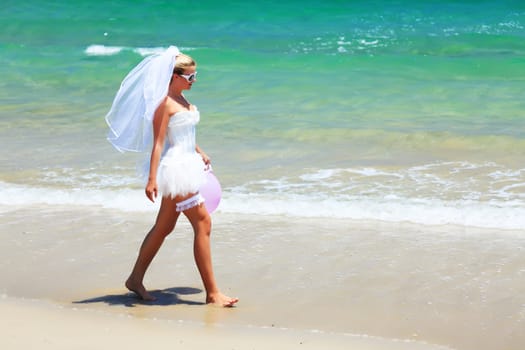 Beautiful young  bride on the tropical beach