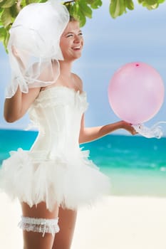 Beautiful young  bride on the tropical beach