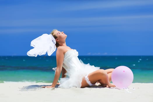 Beautiful young  bride on the tropical beach