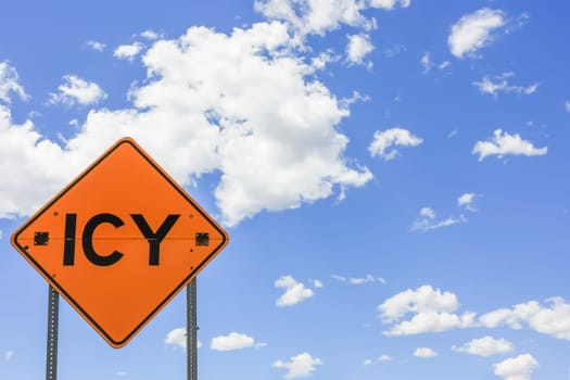 Warning sign icy conditions before summer skies