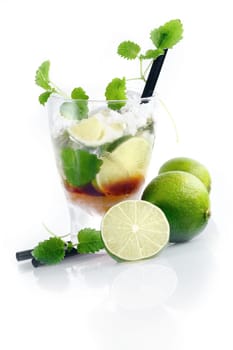 Mojito Cocktail with fresh Limes and Cuban Mint isolated on white background for your alcohol beverage concepts