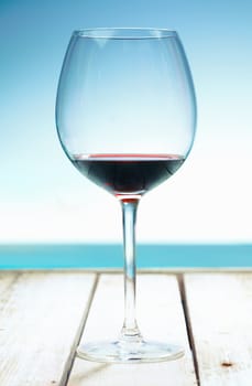 A Glass of Wine at the beach, standing on a footbridge in the south pacific. For your potable concepts take a look at my portofolio.