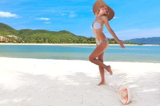 Beautiful woman in bikini on the beach