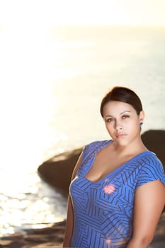 Young beautiful woman outdoor at sunrise time