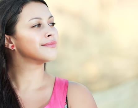 Young beautiful woman outdoor at sunrise time