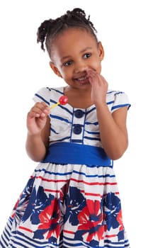 Portrait of a cute little african american girl with a lollipop, isolated on white background
