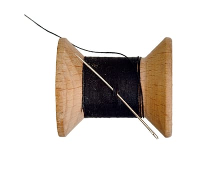 Detail of the sharp needle and black thread