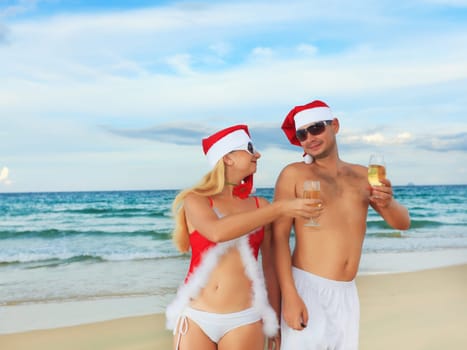 Couple celebrates Christmas at the tropical beach