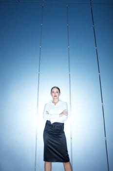 Beautiful business woman standing outdoor modern building