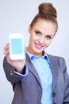 Business woman is showing smart phone