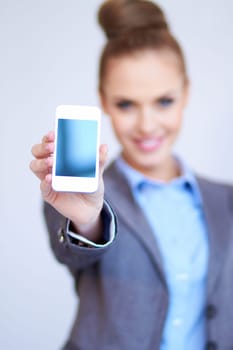 Business woman is showing smart phone