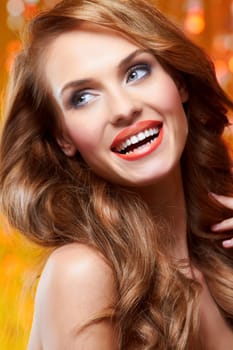Portrait of beautiful sexy woman on yellow background