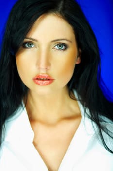 Portrait of beautiful woman wearing white shirt