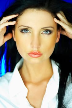 Portrait of beautiful woman wearing white shirt