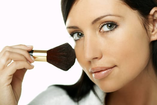 Portrait of Beautiful brunette woman doing daily morning routines (the make up series)