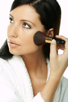 Portrait of Beautiful brunette woman doing daily morning routines (the make up series)