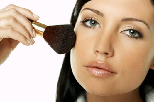 Portrait of Beautiful brunette woman doing daily morning routines (the make up series)