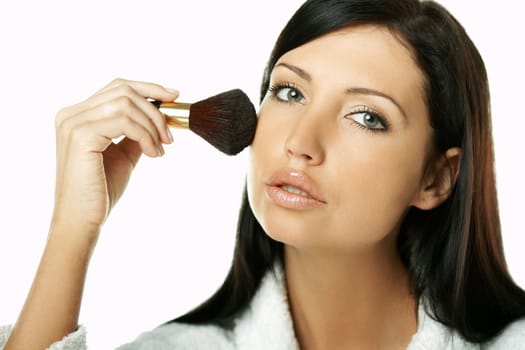 Portrait of Beautiful brunette woman doing daily morning routines (the make up series)