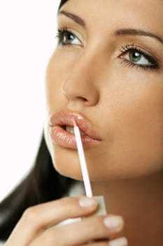 Portrait of Beautiful brunette woman doing daily morning routines (the make up series)