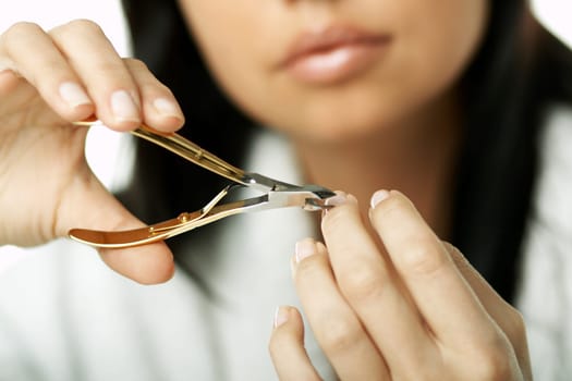 Portrait of Beautiful brunette woman doing daily morning routines (the make up series)