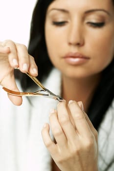 Portrait of Beautiful brunette woman doing daily morning routines (the make up series)