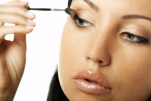 Portrait of Beautiful brunette woman doing daily morning routines (the make up series)