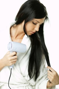 Portrait of Beautiful brunette woman doing daily morning routines (the make up series)