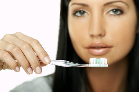 Portrait of Beautiful brunette woman doing daily morning routines (the make up series)