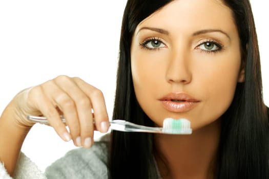 Young beautiful woman during daily morning routines