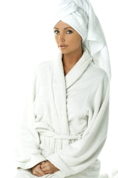 Portrait of Fresh and Beautiful brunette woman wearing white towel on her head