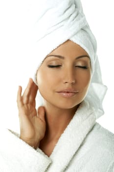 Portrait of Fresh and Beautiful brunette woman wearing white towel on her head